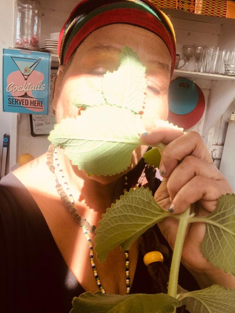 Empress Sabrina holding fresh leaves